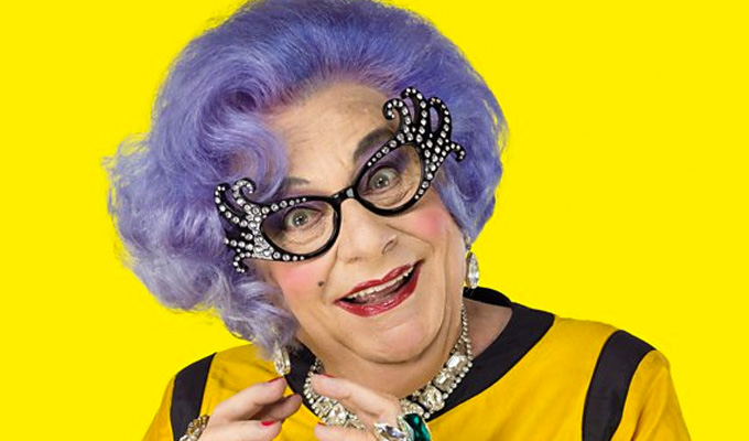 Quite the spectacle! | Dame Edna's glasses fetch £37k at auciton