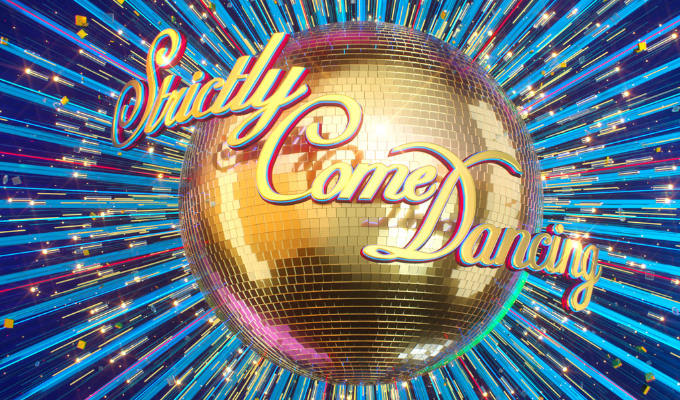 Which comic's voice can you hear on the Strictly theme tune? | A good bit of trivia!